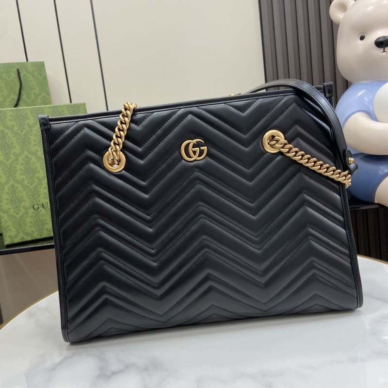 G*u*i shopping bags